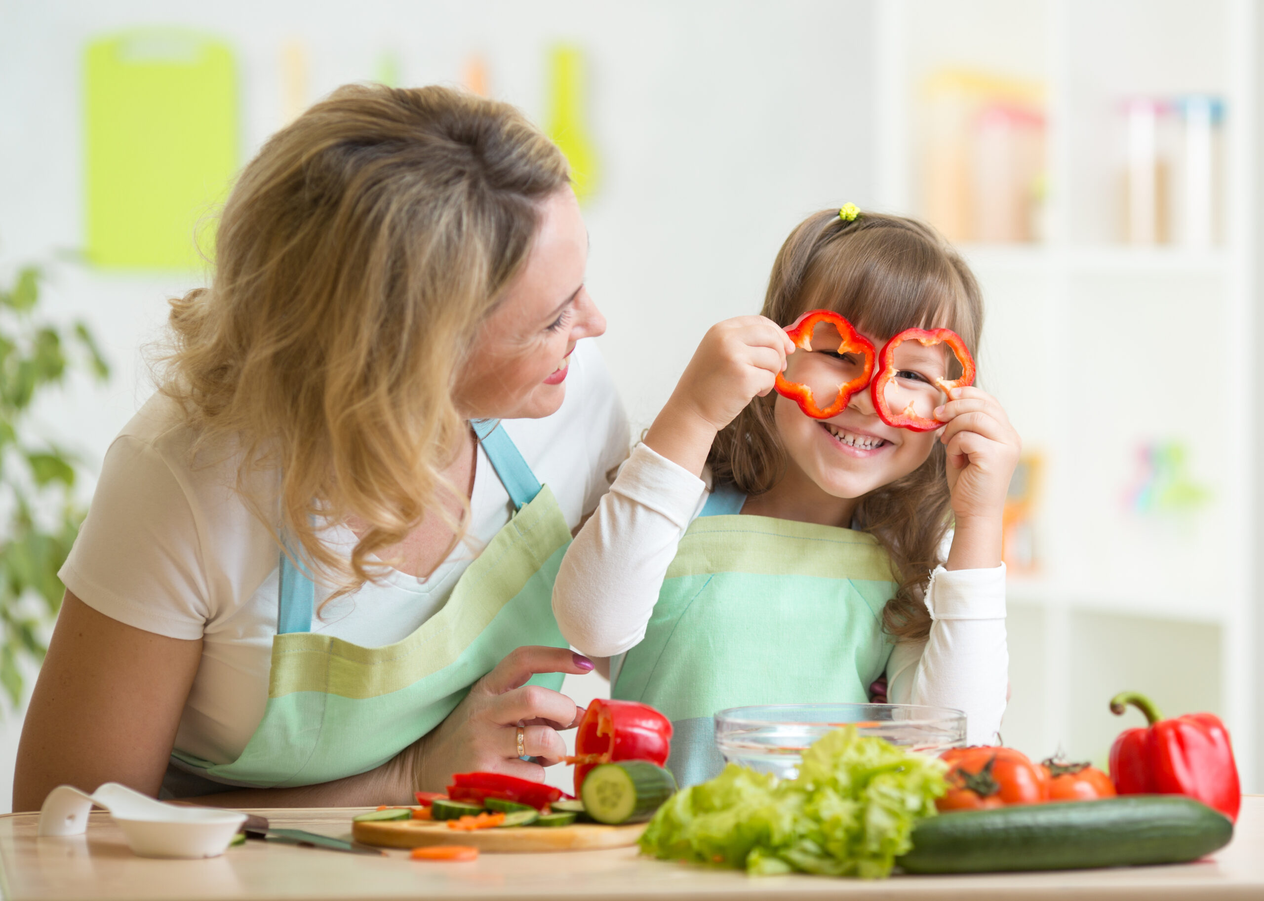 Children playing a fun and interactive food game, exploring healthy fruits and vegetables in a hands-on learning activity